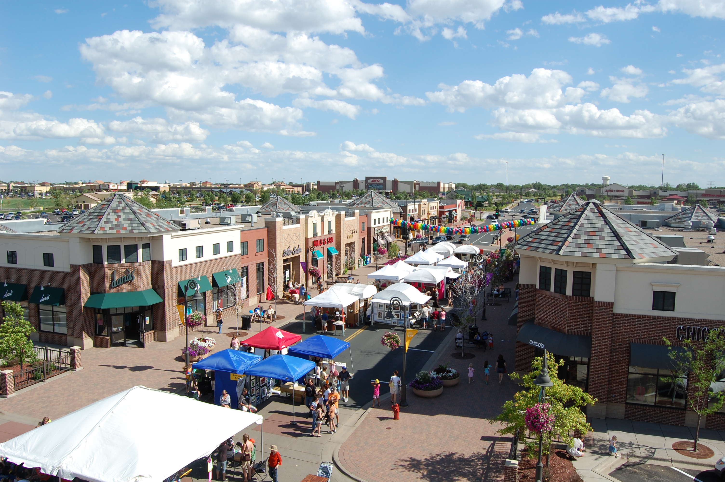 suburban downtown Maple_Grove_Main_Street_During_Annual_Art_Fair